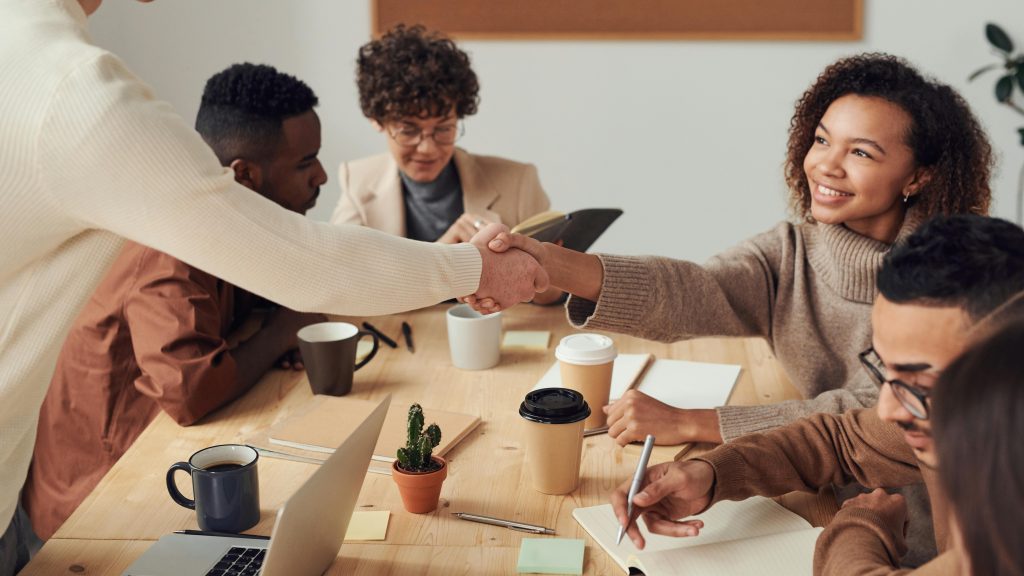 new employees shaking hands